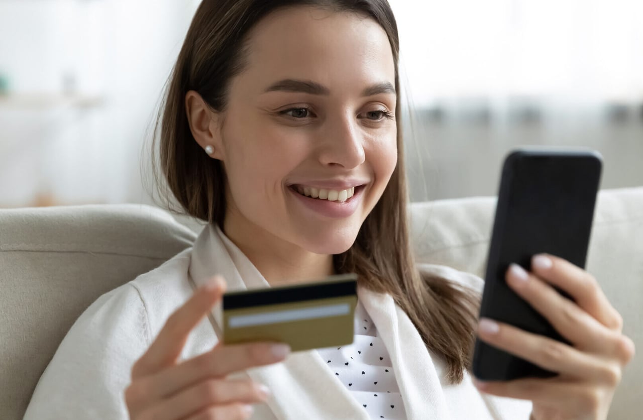 A patient paying a balance at the front desk